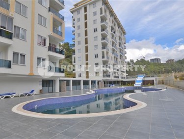 Inexpensive furnished apartment 1+1 with an area of 60 m2, Avsallar district-id-4849-photo-1