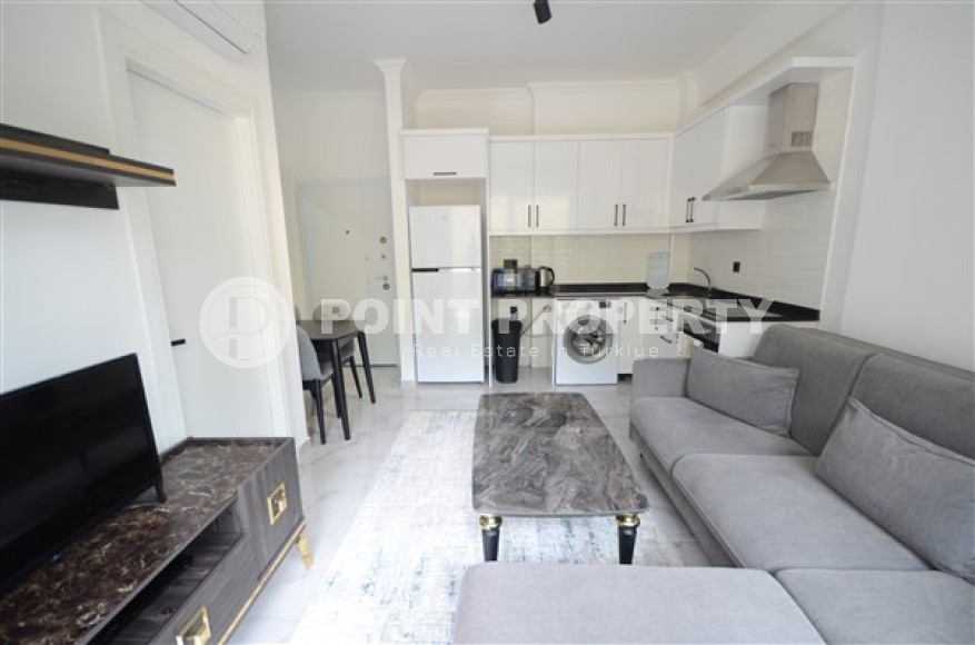 Inexpensive furnished apartment 1+1 with an area of 60 m2, Avsallar district-id-4849-photo-2