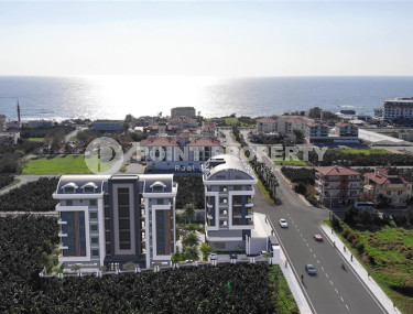 Comfortable apartments are available for sale, ranging from cozy 1+1 to spacious 3+1 duplexes, in the newest Okurcalar complex 300 meters from the sea.-id-1051-photo-5