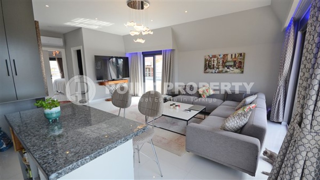 Двухуровневые апартаменты с видовой террасой, планировкой 2+1, в центральном районе города Аланьи- Гюллер Пынары, рядом с пляжем Кейкубат-id-4859-фото-3