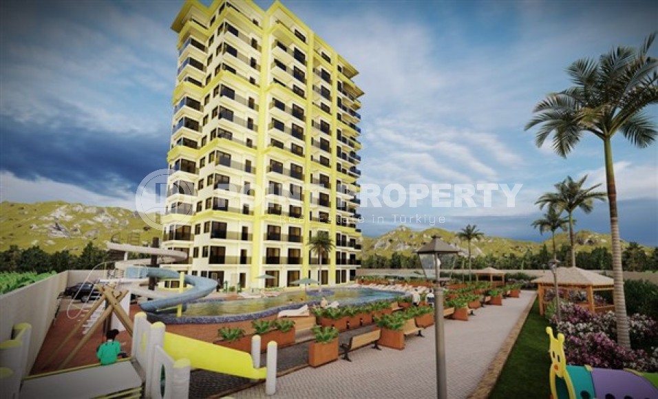 Apartment 1+1 at an inexpensive price in a high-rise complex under construction, Mahmutlar district-id-4870-photo-18