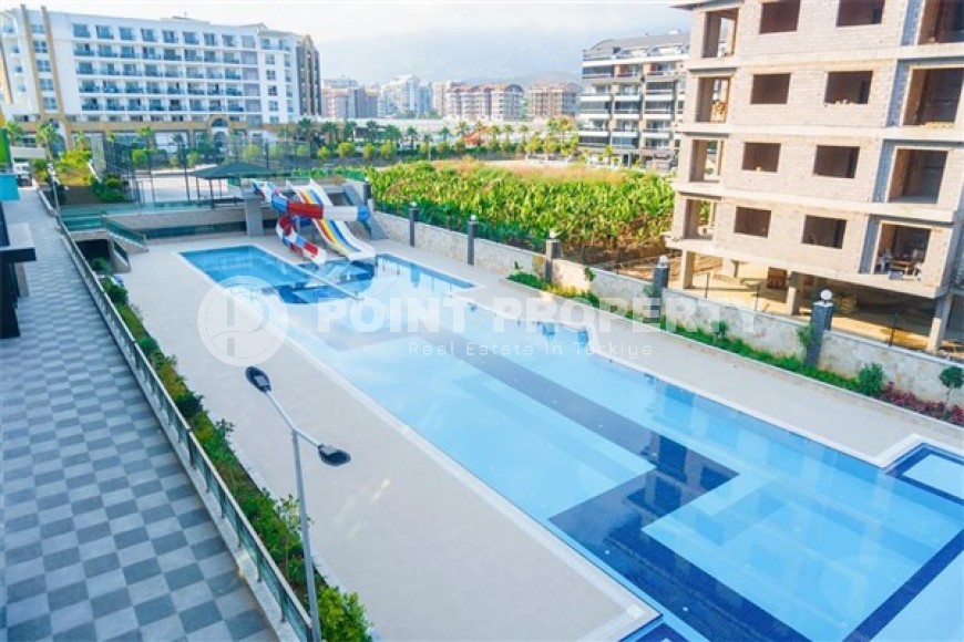 Небольшая квартира с современным ремонтом, в жилом комплексе премиум класса, в районе города Аланья- Каргыджак-id-4873-фото-11