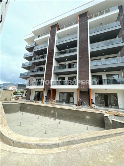 Строящиеся двухкомнатные апартаменты с площадью 63 м2, район Тосмур-id-4878-фото-9