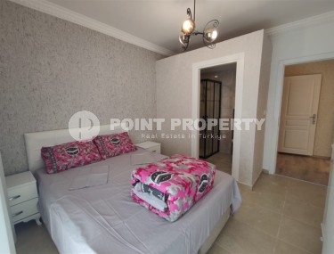 Меблированная квартира с двумя спальнями в 150 метрах от пляжа в центре популярного района Аланьи Махмутлар.-id-4222-фото-5