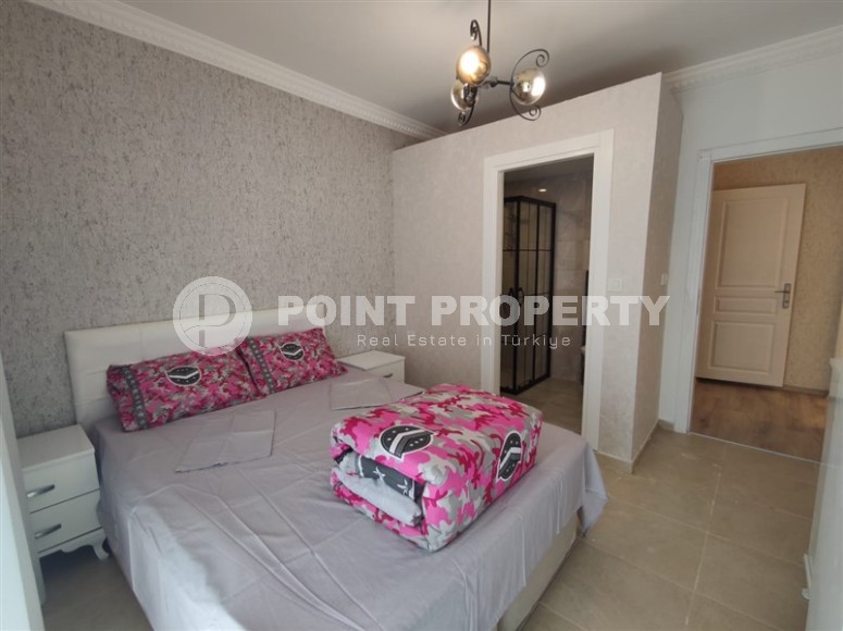 Меблированная квартира с двумя спальнями в 150 метрах от пляжа в центре популярного района Аланьи Махмутлар.-id-4222-фото-5