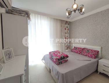 Меблированная квартира с двумя спальнями в 150 метрах от пляжа в центре популярного района Аланьи Махмутлар.-id-4222-фото-4