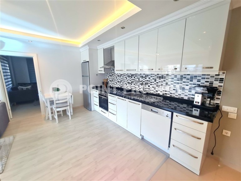 Charming one-bedroom apartment of 75 m2 with furniture located in Alanya, Oba-id-4894-photo-5
