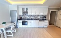 Charming one-bedroom apartment of 75 m2 with furniture located in Alanya, Oba-id-4894-photo-6