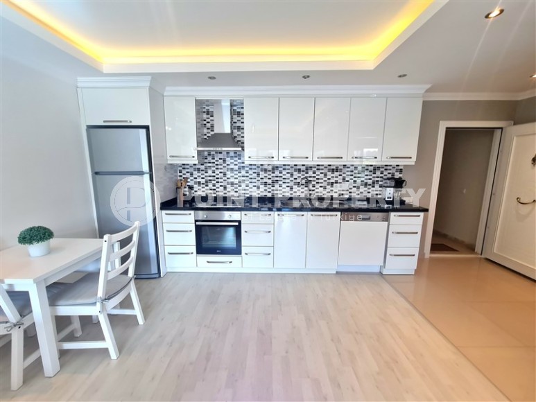 Charming one-bedroom apartment of 75 m2 with furniture located in Alanya, Oba-id-4894-photo-6
