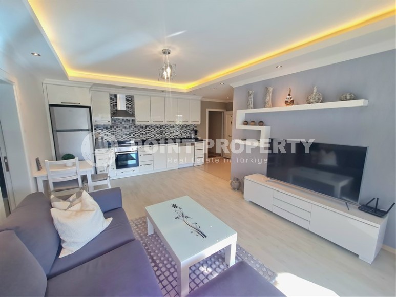 Charming one-bedroom apartment of 75 m2 with furniture located in Alanya, Oba-id-4894-photo-2
