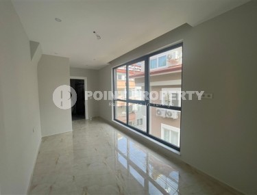 Двухуровневая квартира в чистовой отделке, планировкой 2+1 в центре города Аланья-id-4907-фото-4