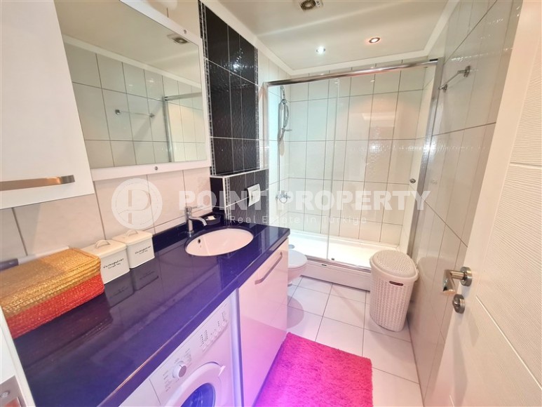 Комфортабельная квартира с современным дизайном, мебелью и бытовой техникой в 750 метрах от пляжа в районе Оба-id-4911-фото-15