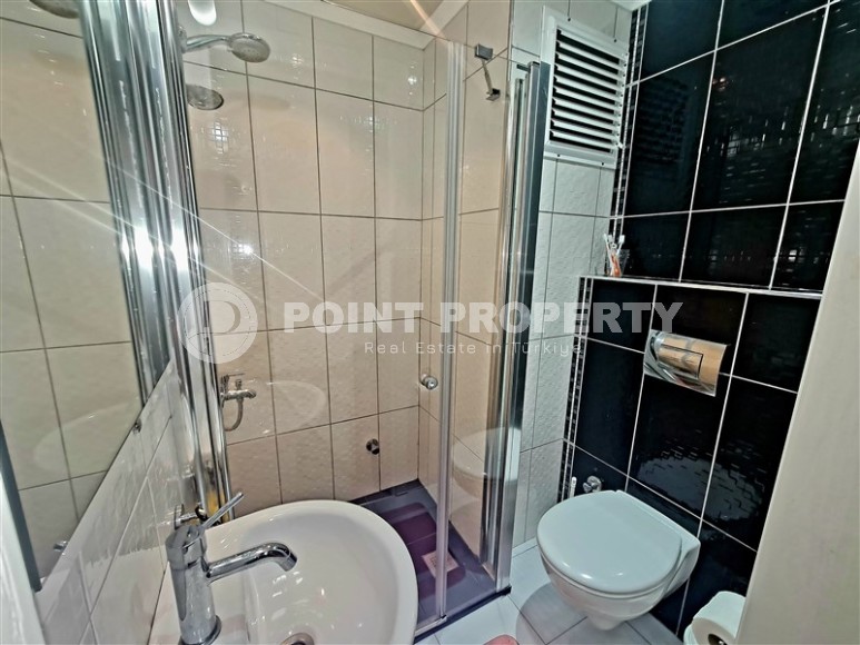 Комфортабельная квартира с современным дизайном, мебелью и бытовой техникой в 750 метрах от пляжа в районе Оба-id-4911-фото-16