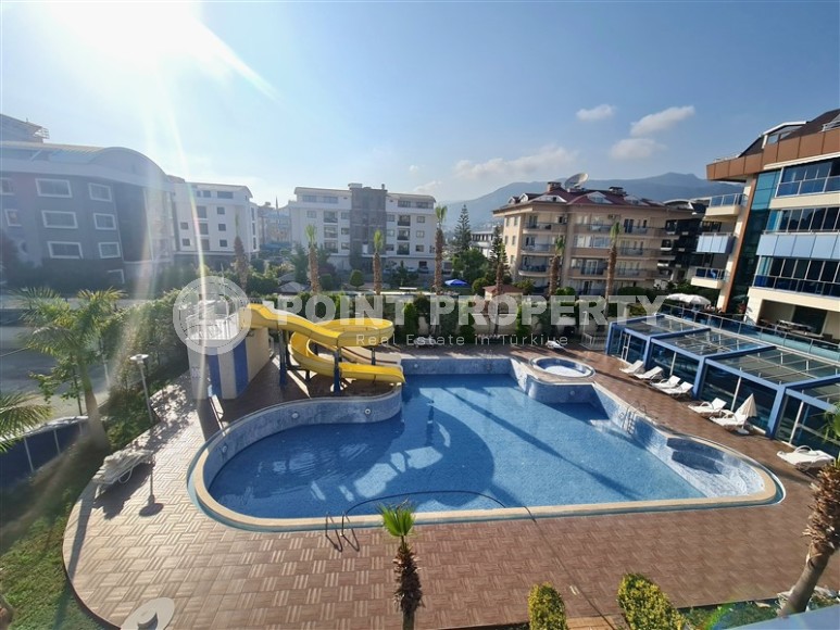 Комфортабельная квартира с современным дизайном, мебелью и бытовой техникой в 750 метрах от пляжа в районе Оба-id-4911-фото-25