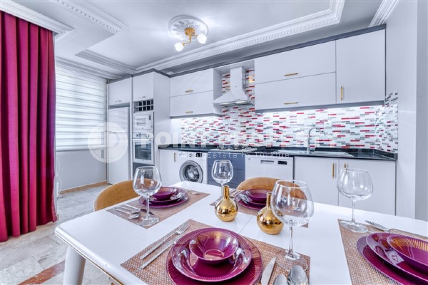 Комфортабельные апартаменты с современным дизайном и красивым панорамным видом, планировкой 3+1 в районе Махмутлар-id-4914-фото-4