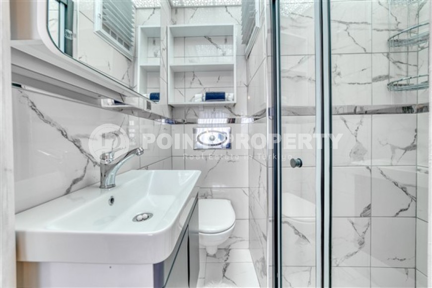 Комфортабельные апартаменты с современным дизайном и красивым панорамным видом, планировкой 3+1 в районе Махмутлар-id-4914-фото-10