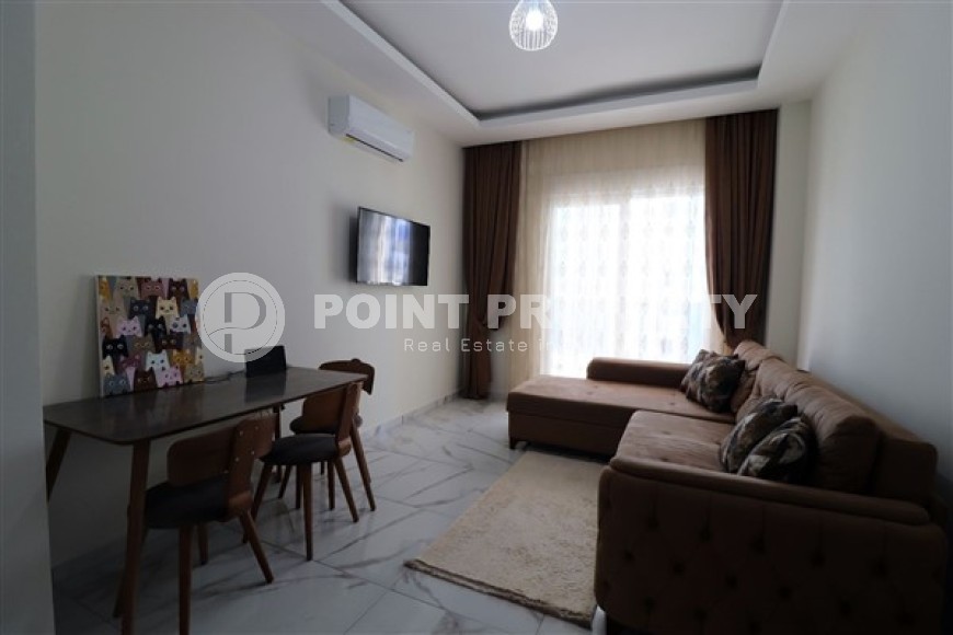 Compact two-room apartment with an area of 50 m2 located in the Mahmutlar area-id-4920-photo-2