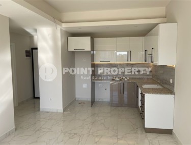 Новая квартира 1+1, общей площадью 55 м2, в 900 метрах от моря в районе Авсаллар-id-4929-фото-2