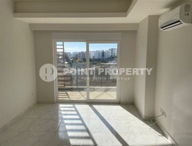 Новая квартира 1+1, общей площадью 55 м2, в 900 метрах от моря в районе Авсаллар-id-4929-фото-4