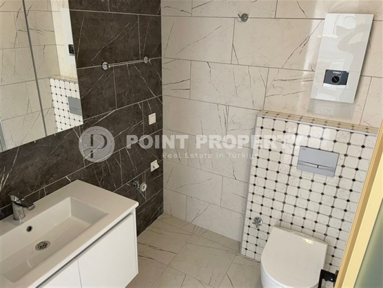 Новая квартира 1+1, общей площадью 55 м2, в 900 метрах от моря в районе Авсаллар-id-4929-фото-5