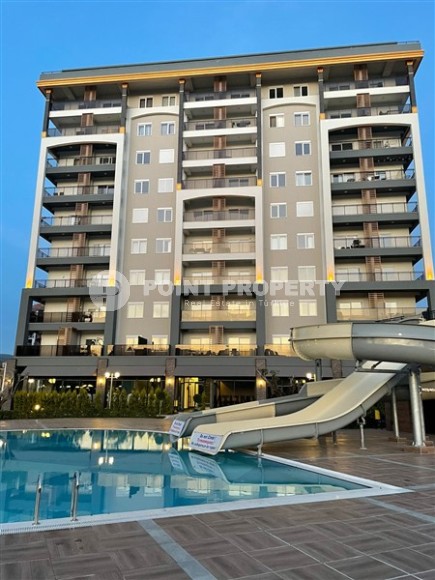 Новая квартира 1+1, общей площадью 55 м2, в 900 метрах от моря в районе Авсаллар-id-4929-фото-17