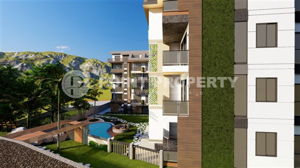 Two bedroom apartment, 90m² in a complex under construction, in Alanya - Oba-id-1400-photo-7