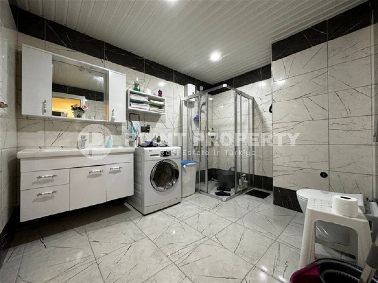 Двухуровневые апартаменты вблизи Торосских гор, с видовой террасой на Средиземное море, планировкой 3+1, в центре города Аланья-id-4936-фото-9