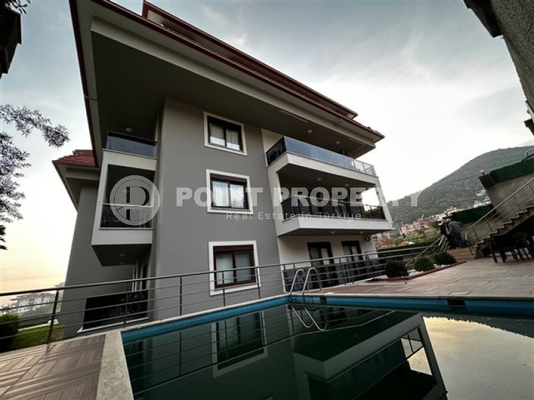 Двухуровневые апартаменты вблизи Торосских гор, с видовой террасой на Средиземное море, планировкой 3+1, в центре города Аланья-id-4936-фото-19