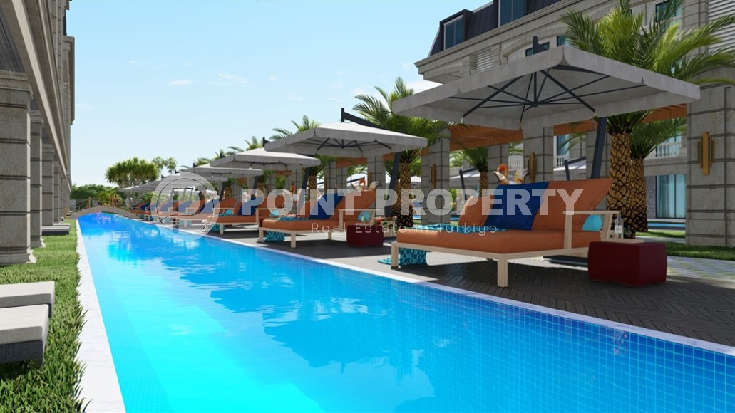 Двухкомнатные квартиры и трёхкомнатные дуплексы в малоэтажной резиденции отельного типа, район Тюрклер-id-4943-фото-14