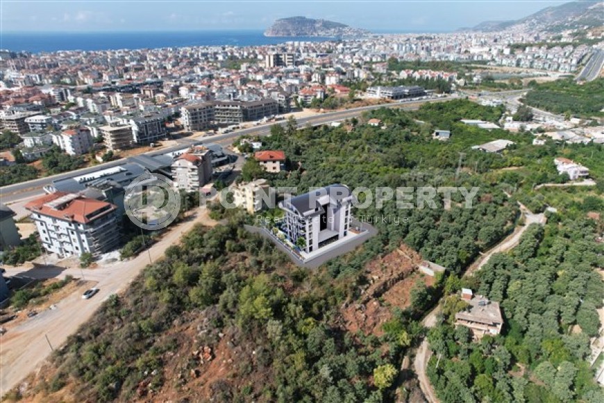 Апартаменты и дуплексы в резиденции на этапе строительства с возможностью получения рассрочки и вида на жительство в Турции-id-4951-фото-12