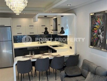 Роскошные 2+1 апартаменты с площадью 110 м2 и мебелью, район Махмутлар-id-4963-фото-2