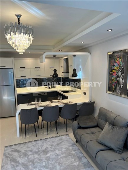 Роскошные 2+1 апартаменты с площадью 110 м2 и мебелью, район Махмутлар-id-4963-фото-2