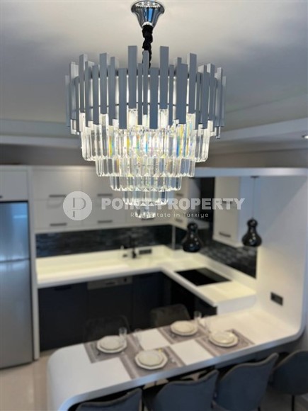 Роскошные 2+1 апартаменты с площадью 110 м2 и мебелью, район Махмутлар-id-4963-фото-3