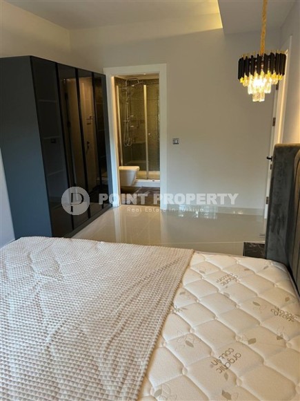 Роскошные 2+1 апартаменты с площадью 110 м2 и мебелью, район Махмутлар-id-4963-фото-5