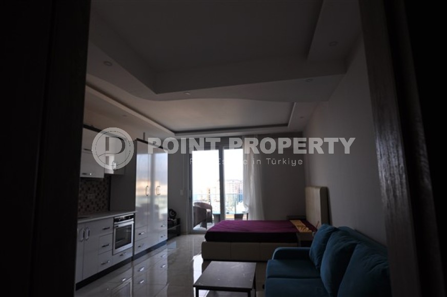 Compact studio 1+0 at an inexpensive price on the 11th floor of the building, Mahmutlar district-id-4965-photo-2