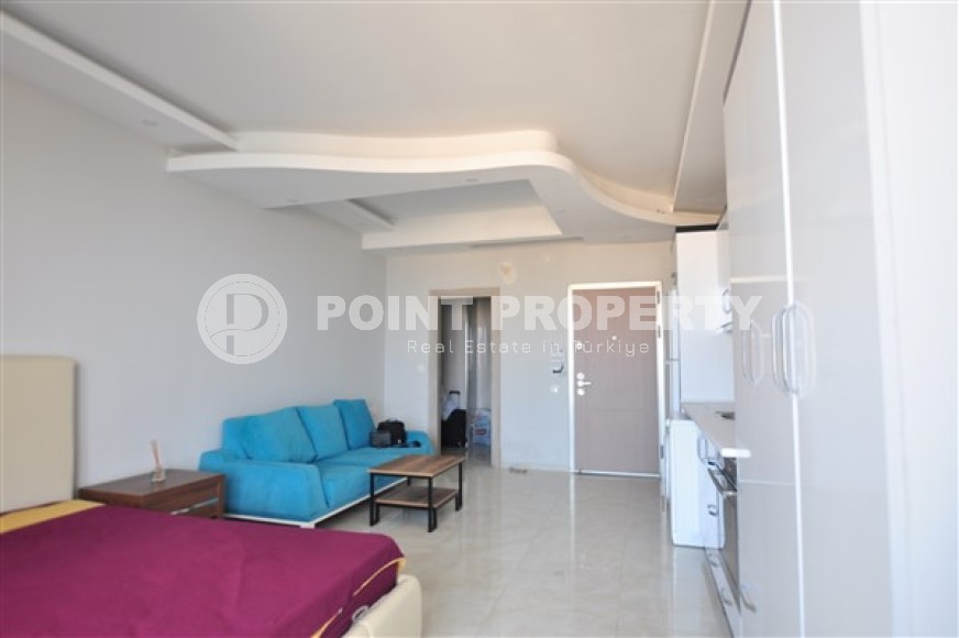 Compact studio 1+0 at an inexpensive price on the 11th floor of the building, Mahmutlar district-id-4965-photo-3