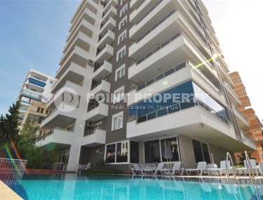 Atmospheric 1+1 apartment with an area of 70 m2 and furniture, Mahmutlar district-id-4966-photo-1