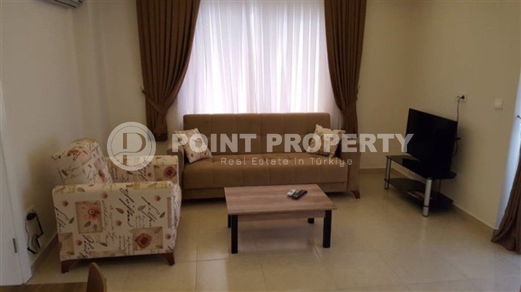 Atmospheric 1+1 apartment with an area of 70 m2 and furniture, Mahmutlar district-id-4966-photo-4