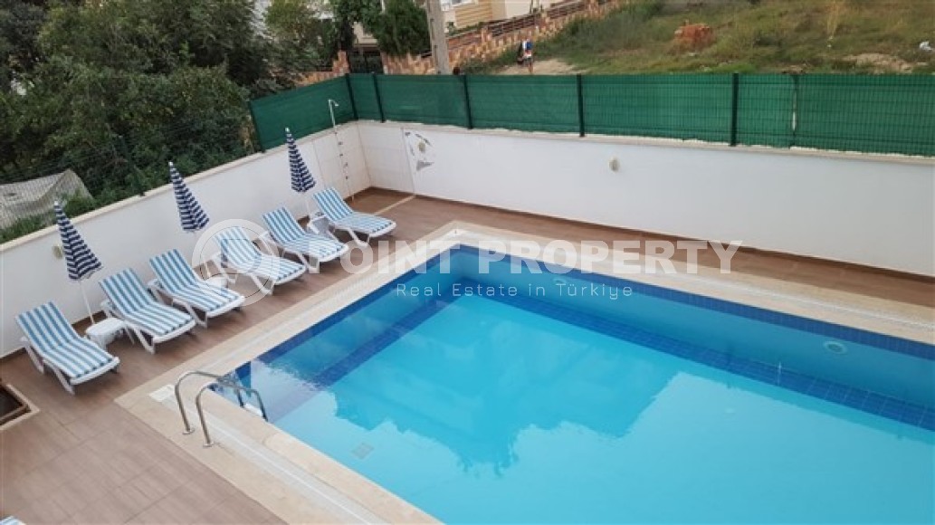 Atmospheric 1+1 apartment with an area of 70 m2 and furniture, Mahmutlar district-id-4966-photo-9