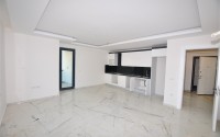 Ready to move in 1+1 apartment 76 m2 in a complex with excellent infrastructure, Mahmutlar-id-4970-photo-2