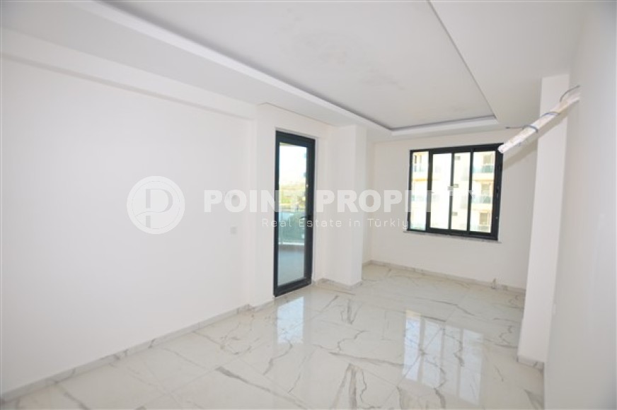 Ready to move in 1+1 apartment 76 m2 in a complex with excellent infrastructure, Mahmutlar-id-4970-photo-4