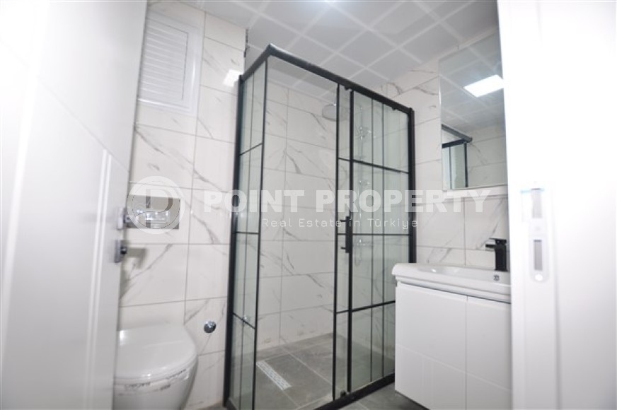 Ready to move in 1+1 apartment 76 m2 in a complex with excellent infrastructure, Mahmutlar-id-4970-photo-5