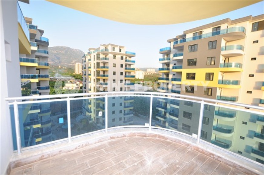 Ready to move in 1+1 apartment 76 m2 in a complex with excellent infrastructure, Mahmutlar-id-4970-photo-6