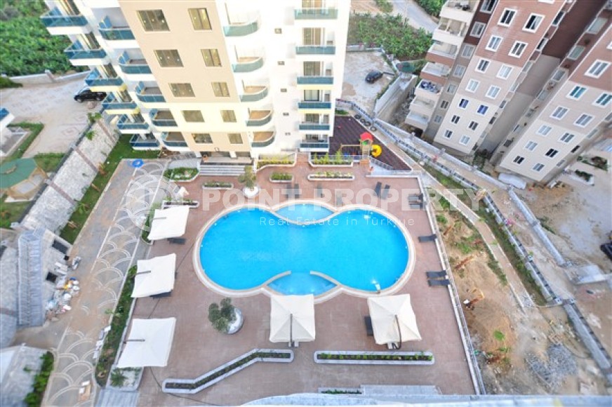 Ready to move in 1+1 apartment 76 m2 in a complex with excellent infrastructure, Mahmutlar-id-4970-photo-8