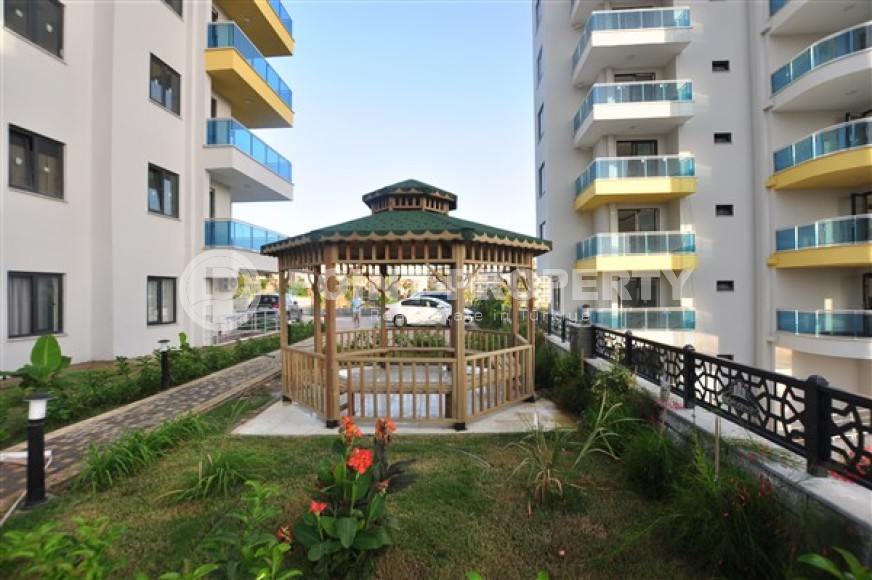 Ready to move in 1+1 apartment 76 m2 in a complex with excellent infrastructure, Mahmutlar-id-4970-photo-10