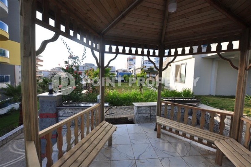 Ready to move in 1+1 apartment 76 m2 in a complex with excellent infrastructure, Mahmutlar-id-4970-photo-11