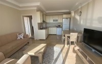 Bright furnished apartment 2+1 three kilometers from the sea, in the Payallar area-id-4973-photo-2