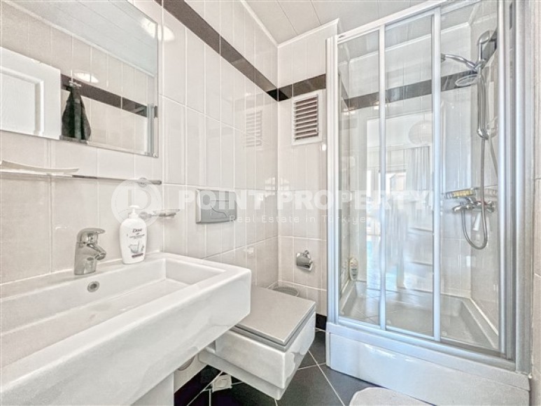 Stylish two-level apartment 3+2 with panoramic sea views, on the 12th floor with an attic, in the center of Mahmutlar-id-4978-photo-11