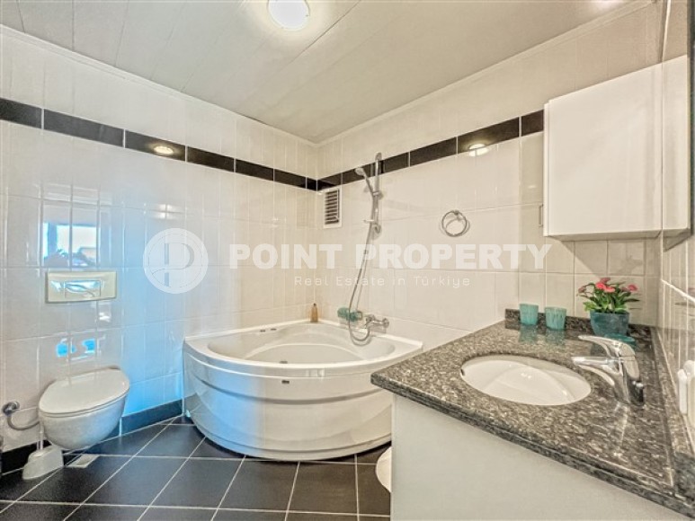 Stylish two-level apartment 3+2 with panoramic sea views, on the 12th floor with an attic, in the center of Mahmutlar-id-4978-photo-12