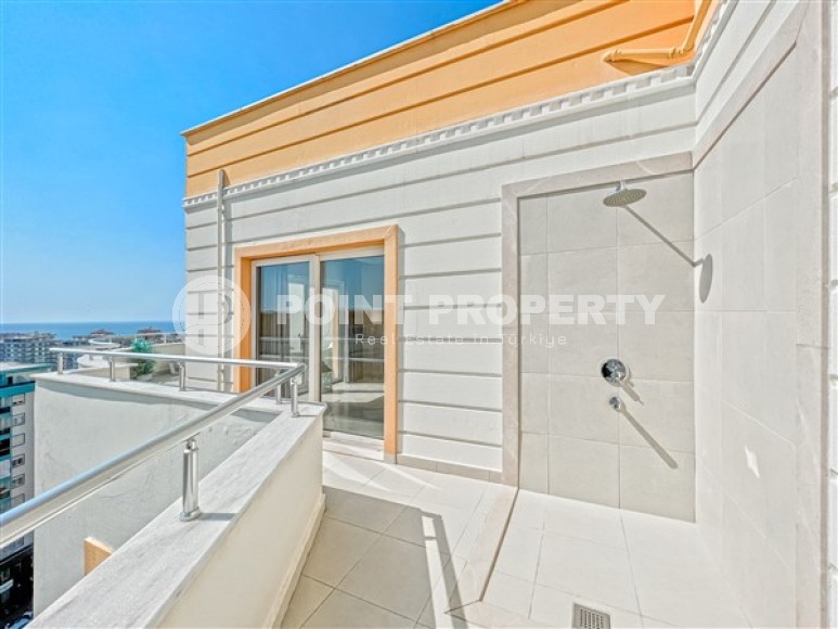 Stylish two-level apartment 3+2 with panoramic sea views, on the 12th floor with an attic, in the center of Mahmutlar-id-4978-photo-17